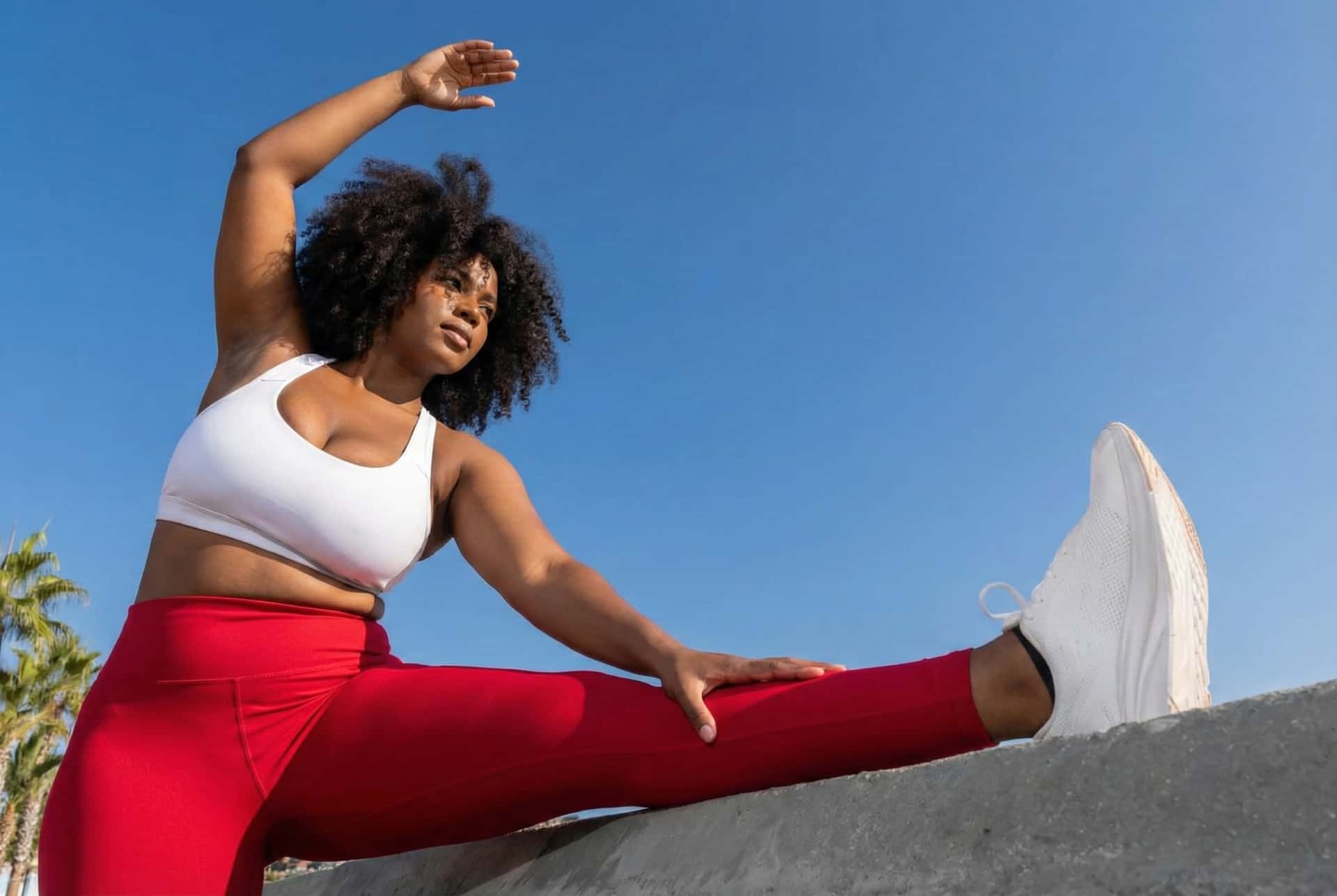 Fitness enthusiast using glucose monitoring smartwatch during workout with real-time metabolic data display